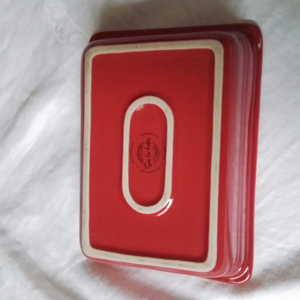 Sur La Table red ceramic baking dish with chicken